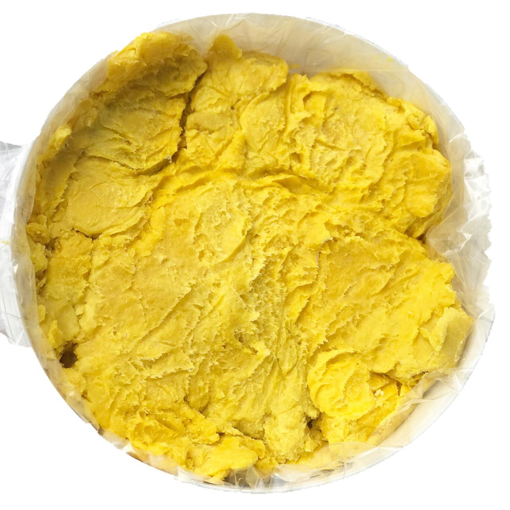 Vibrant yellow shea butter colored with natural borututu root